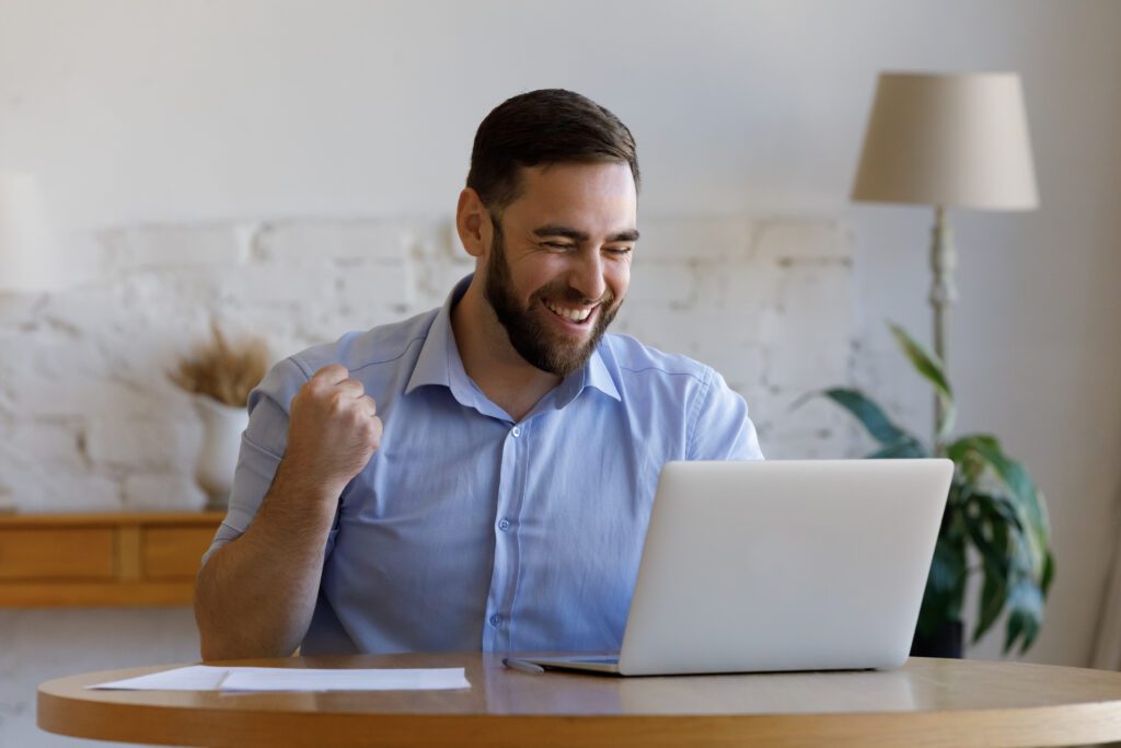 A happy man after overcoming his fears as a freelancer